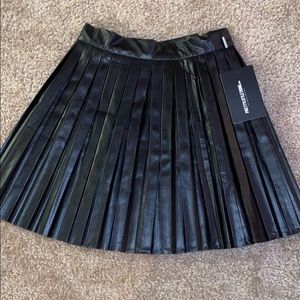 Pleated leather skirt